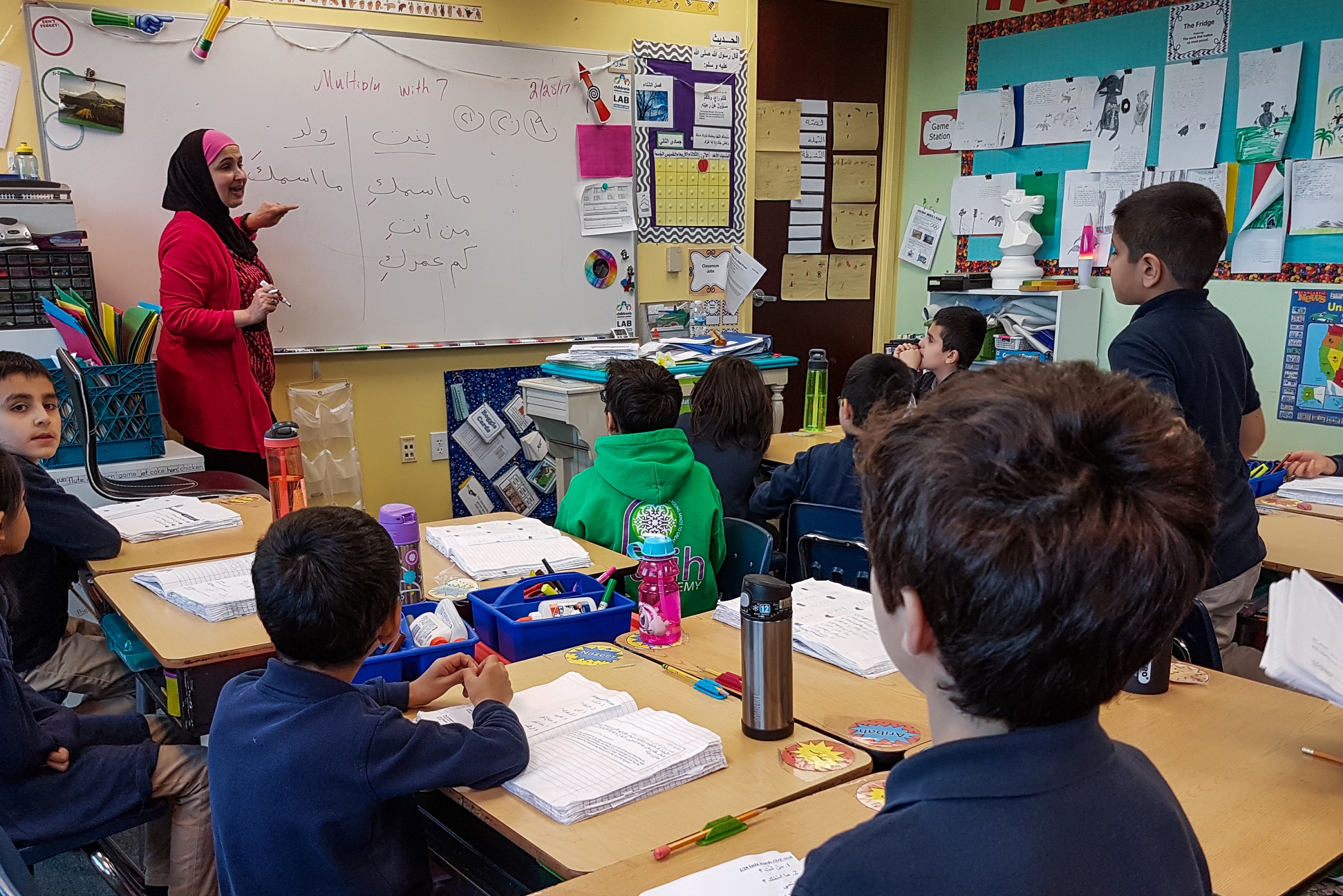 Souad Mohammad teaches Arabic to a third-grade class at Al Fatih Academy in Reston, Va.